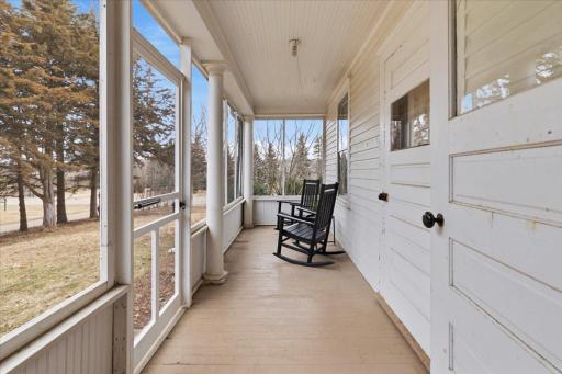 Side porch has assess to dining room and Primary suite