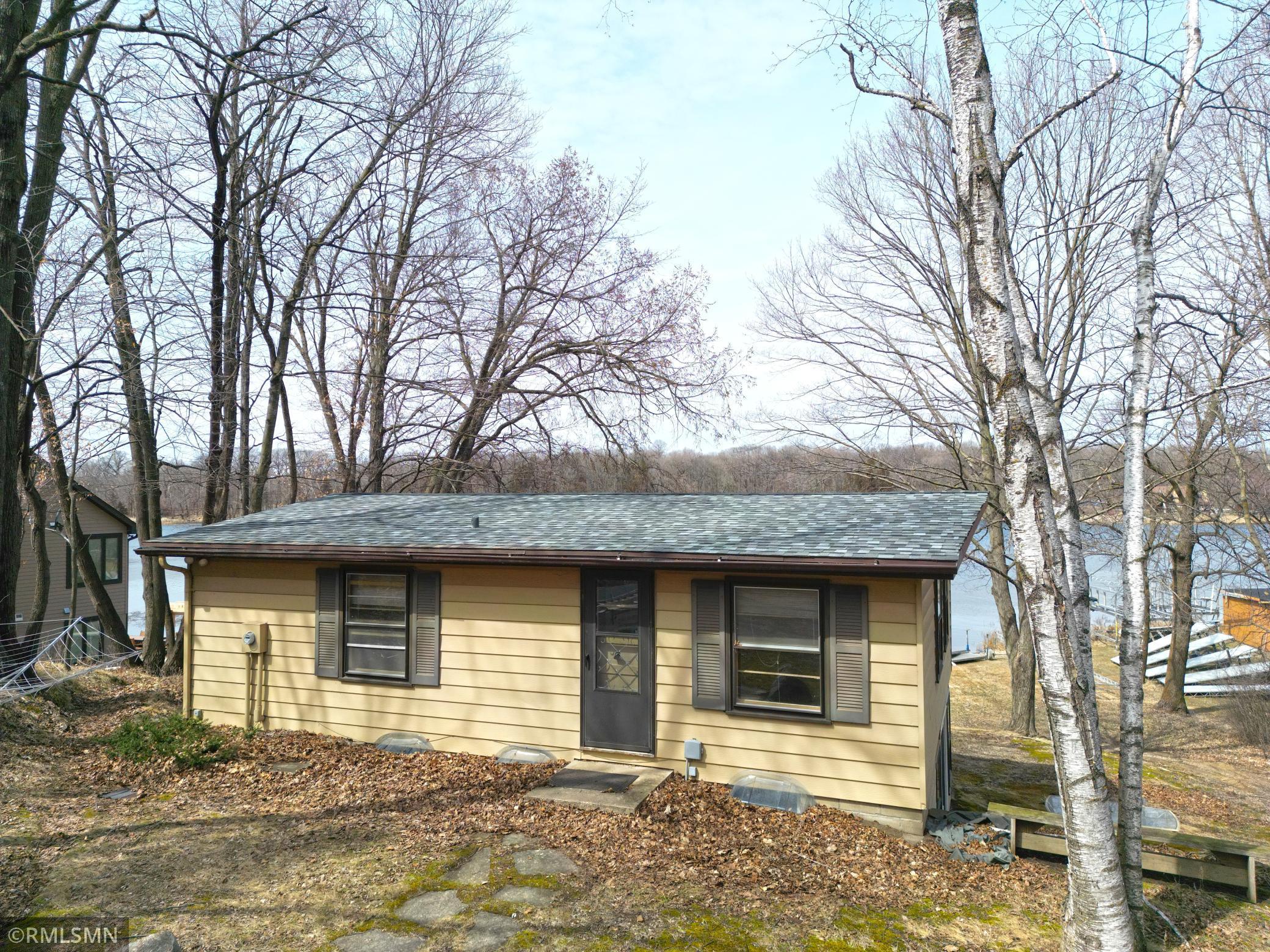 This is the main entrance of this delightful four bedroom one bathroom lake home.