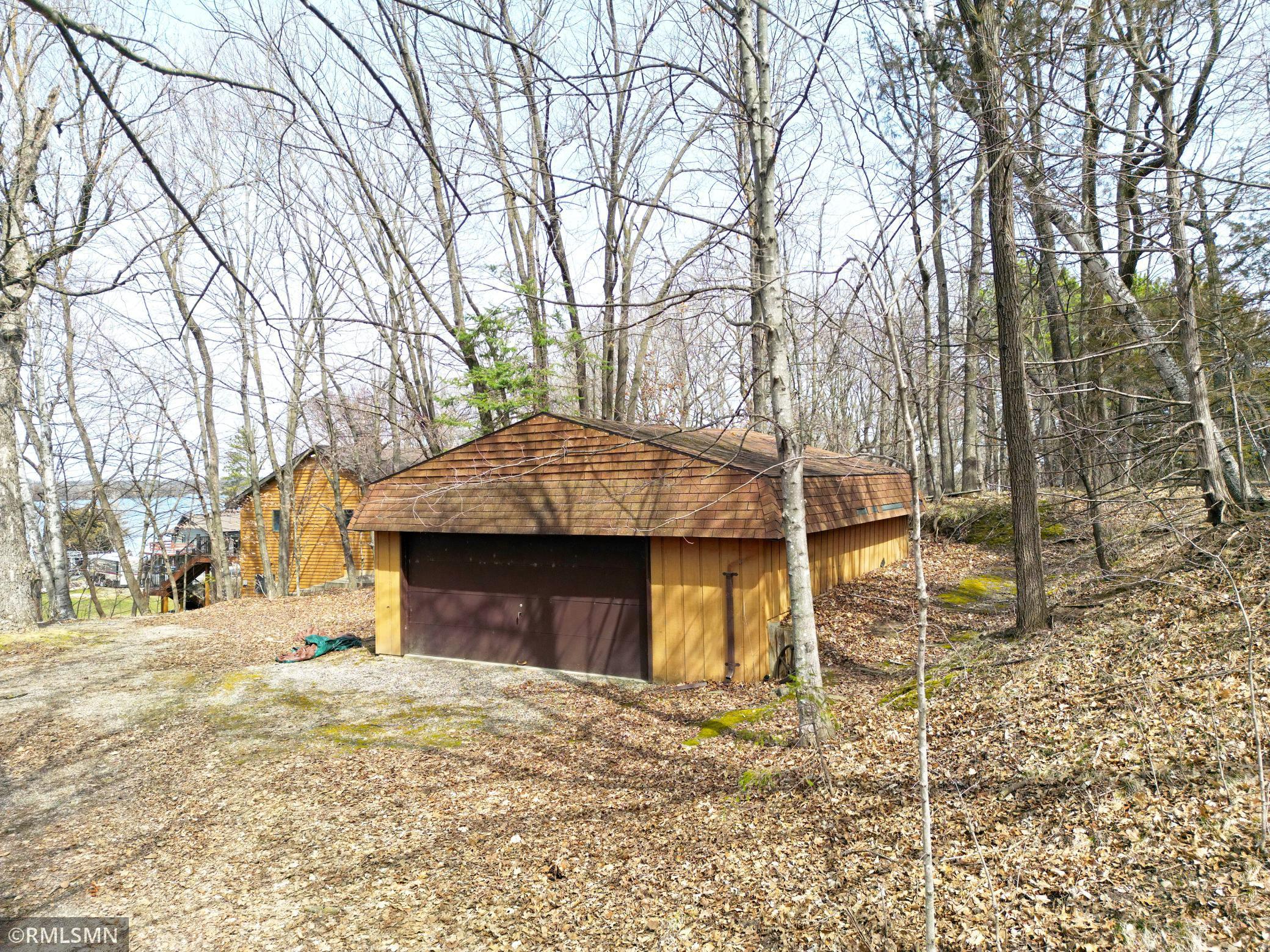 This oversized double garage offer room for your vehicles and lake toys.