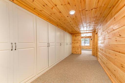 Hallway with great storage on lower level.