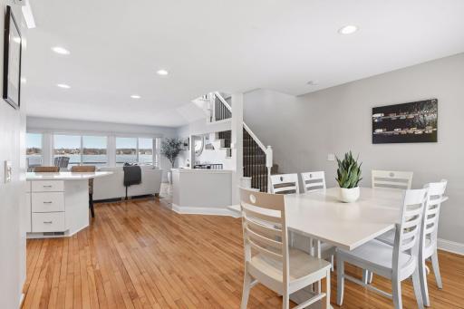 Warm and welcoming dining space with hardwood floors, perfectly positioned next to the kitchen for everyday meals or entertaining.