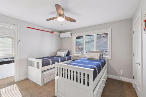 2 of 3 upper level bedrooms complete with bunkroom.