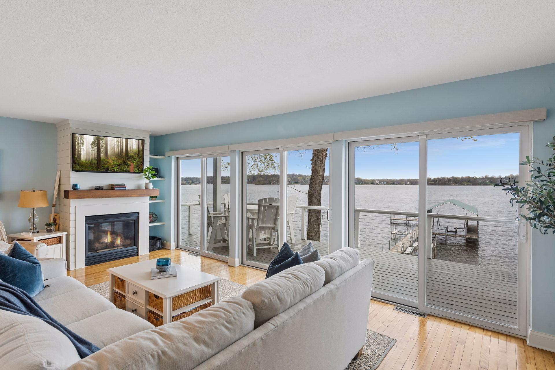 Step outside from each level, whether to a spacious deck or a charming patio. Enjoy direct, level and easy access to the lake.