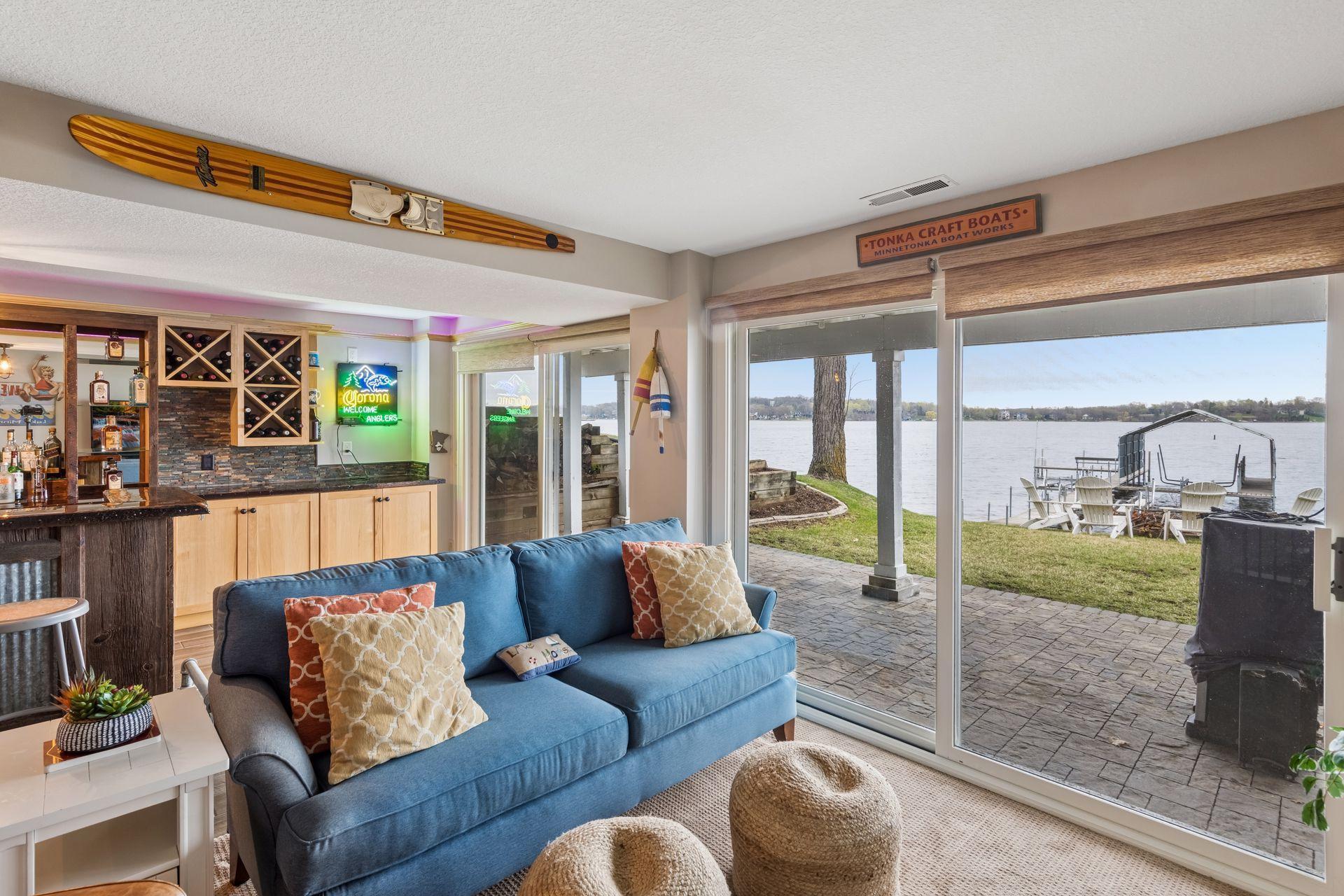 Enjoy this lower-level family room, a perfect mix of comfort and fun for family time, games, and lakehouse relaxation.
