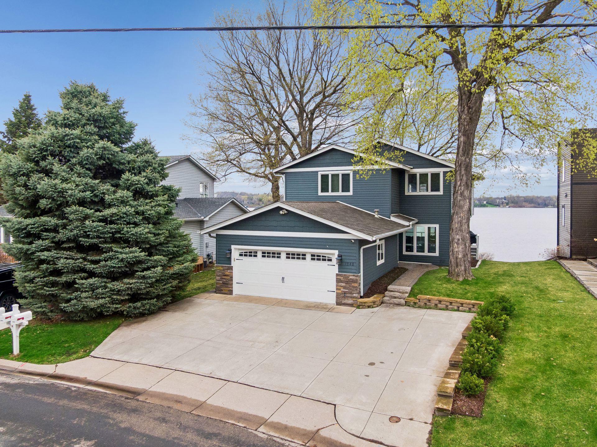 Lake Minnetonka living at its finest! This charming 2 story home offers 69’ of lakeshore and level lakeshore!