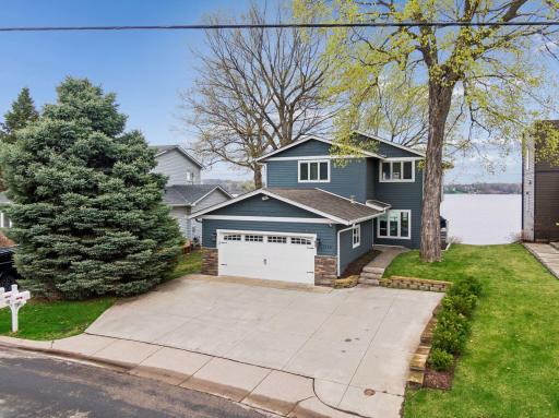 Lake Minnetonka living at its finest! This charming 2 story home offers 69â of lakeshore and level lakeshore!