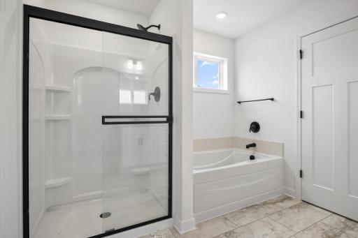 The walk-in shower provides a spa-experience