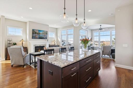 View of the living space and sun room filled with beautiful natural sun light from the great windows.