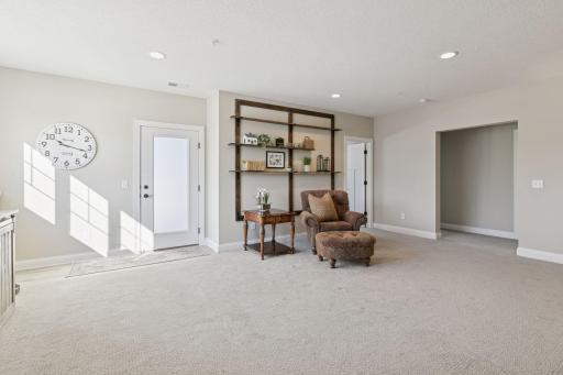 Open area in the lower level where you can decide to use it however you would like.