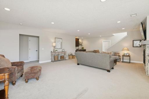 Angle where you can see the basement wet bar! Great for hosting and entertaining.