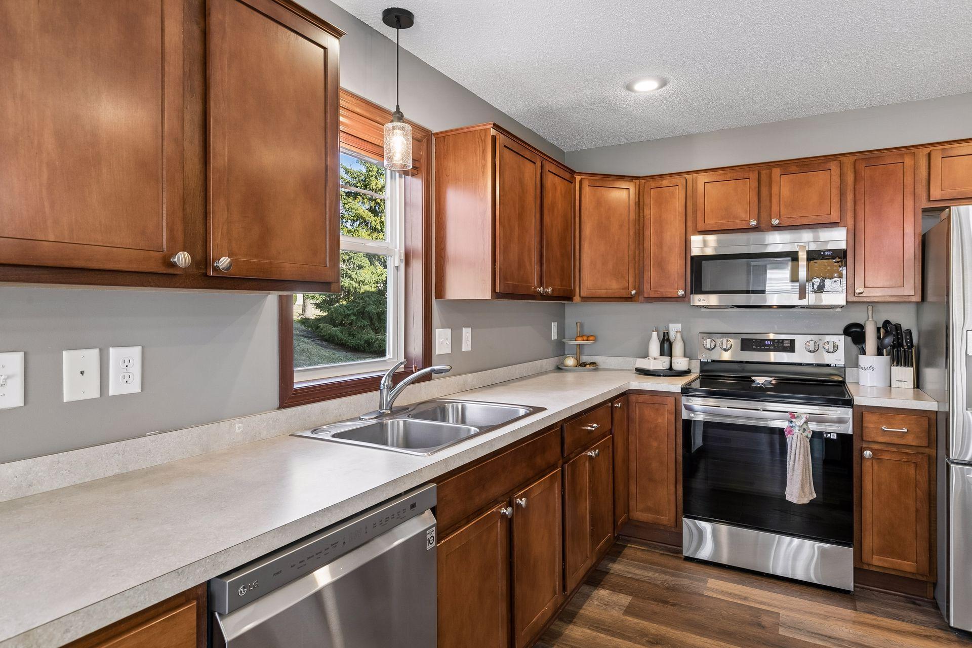 Abundant natural light pours through large windows throughout the home