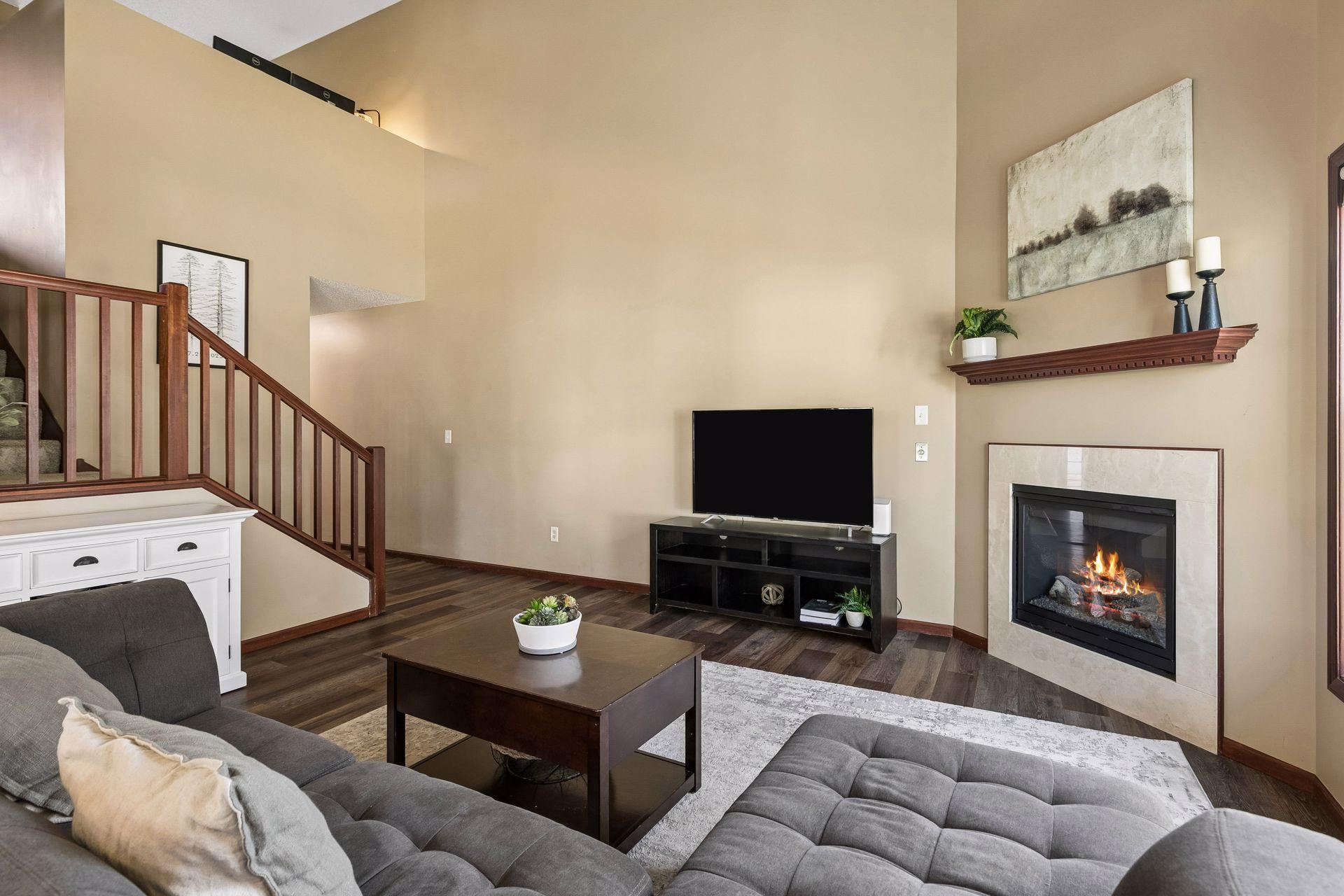 Bright and open main living space with soaring two-story ceilings
