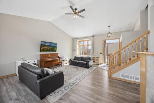 Step into the home and you immediately take note of the impressive vaulted ceilings and ample light!