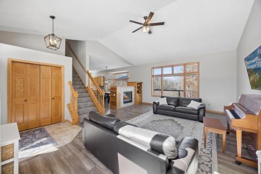The entry closet is perfect for coats and winter gear. The large windows in the living room offer great views of nature below!
