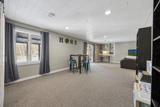 The walk-out allows for easy access to the outdoors. Note the recessed lighting here!