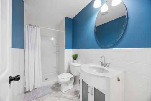 The lower-level 3/4 bathroom is in great shape and fairly new!
