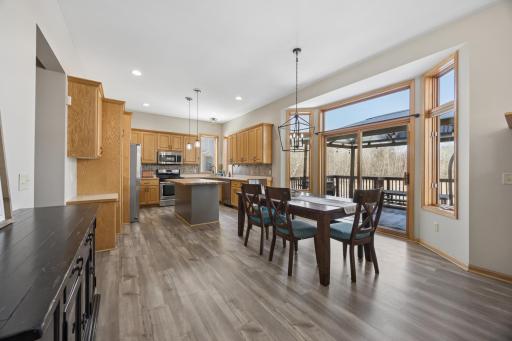 The dining room flows nicely into the kitchen and also offer access to the back deck through the sliding doors.