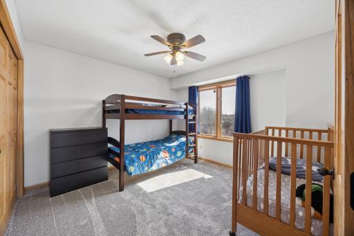 One of the five total bedrooms. This one is on the upper level and overlooks the front yard. New carpet and paint!