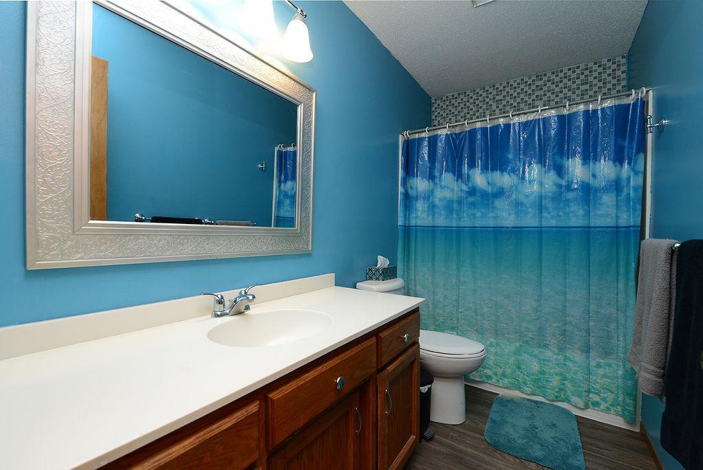 Upper Full Bath With New Flooring