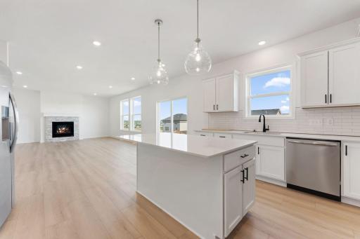 (Photo of an inventory home, actual homes finishes will vary) Multiple furniture arrangements are possible in this beautiful great room.