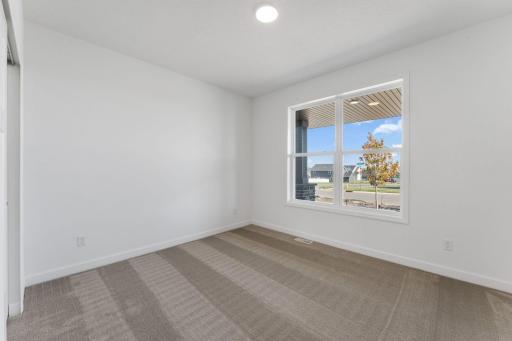 (Photo of an inventory home, actual homes finishes will vary) Main level flex room.