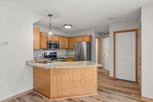 Fully Refreshed Kitchen includes New Granite Countertops, Undermount Sink and Faucet.