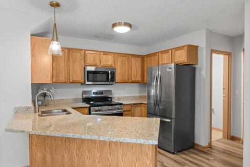 Brand New Stainless Steel Appliance including Refrigerator, Range, Microwave and Dishwasher