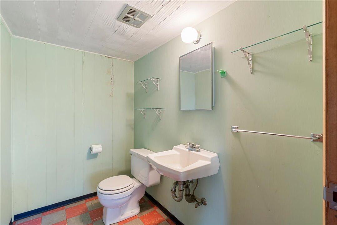 Half bathroom in the finished space above the garage.