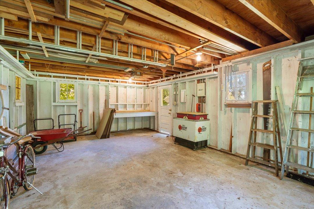 Inside of the 1-stall garage building's main floor.