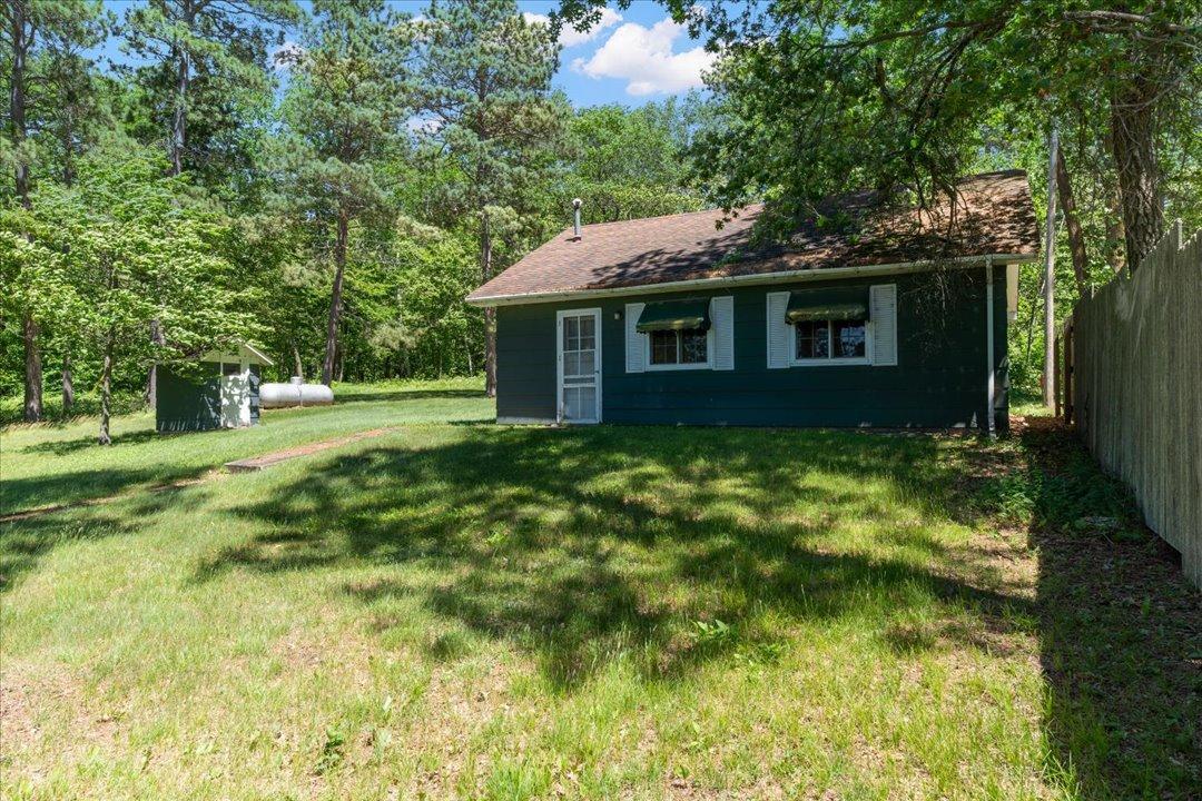 Here is the main cabin on the property. Open concept layout inside and includes a 3/4 bathroom.
