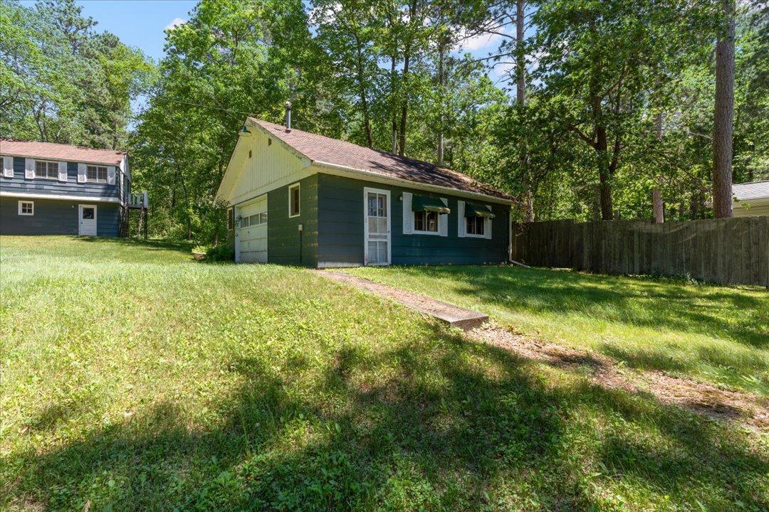 Here is the main cabin on the property. Open concept layout inside and includes a 3/4 bathroom.