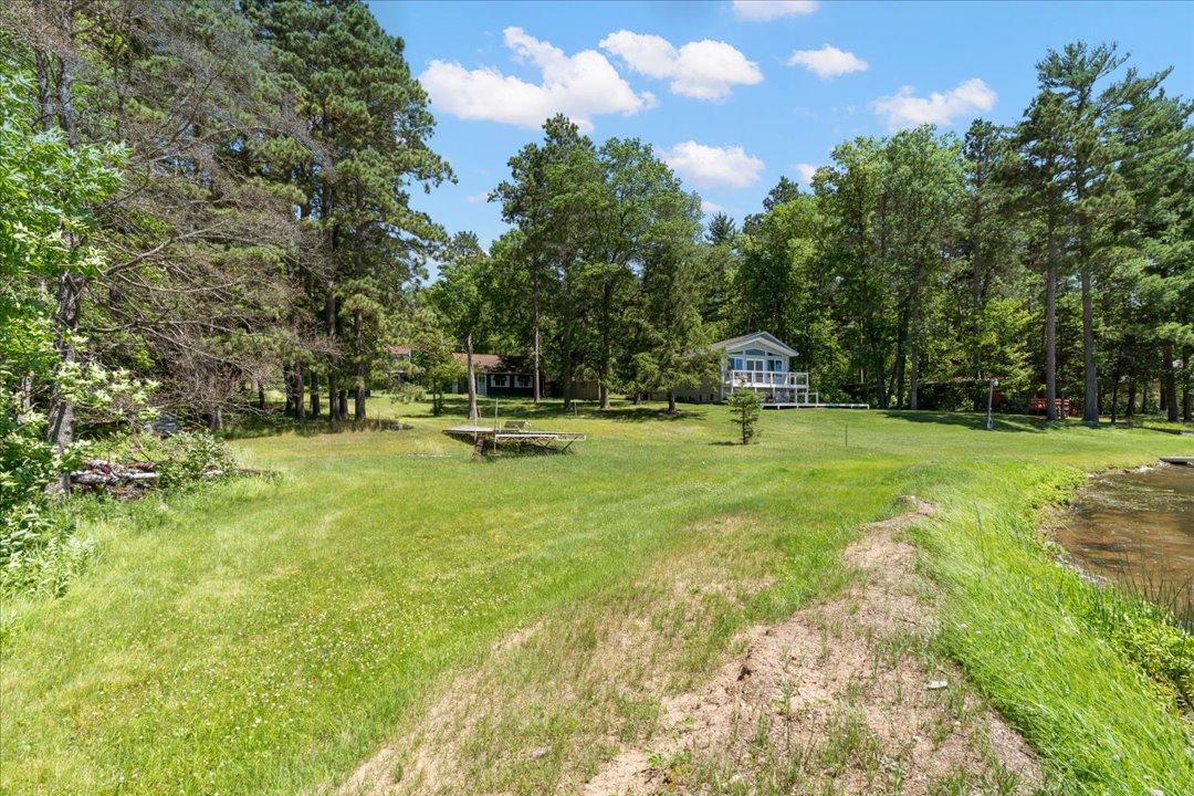 Densely wooded lot on the lake - what more could you want?!