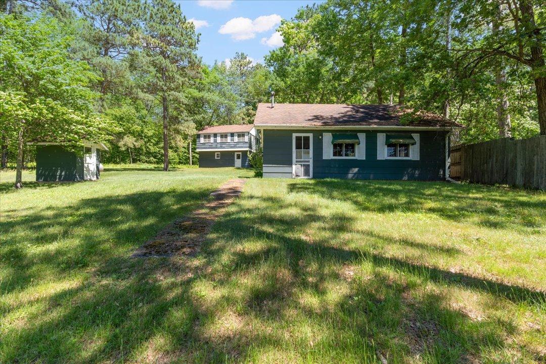 Here is the main cabin on the property. Open concept layout inside and includes a 3/4 bathroom.
