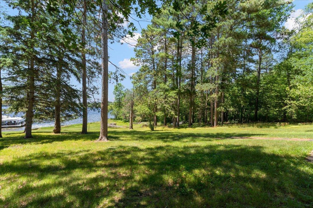 Densely wooded lot on the lake - what more could you want?!