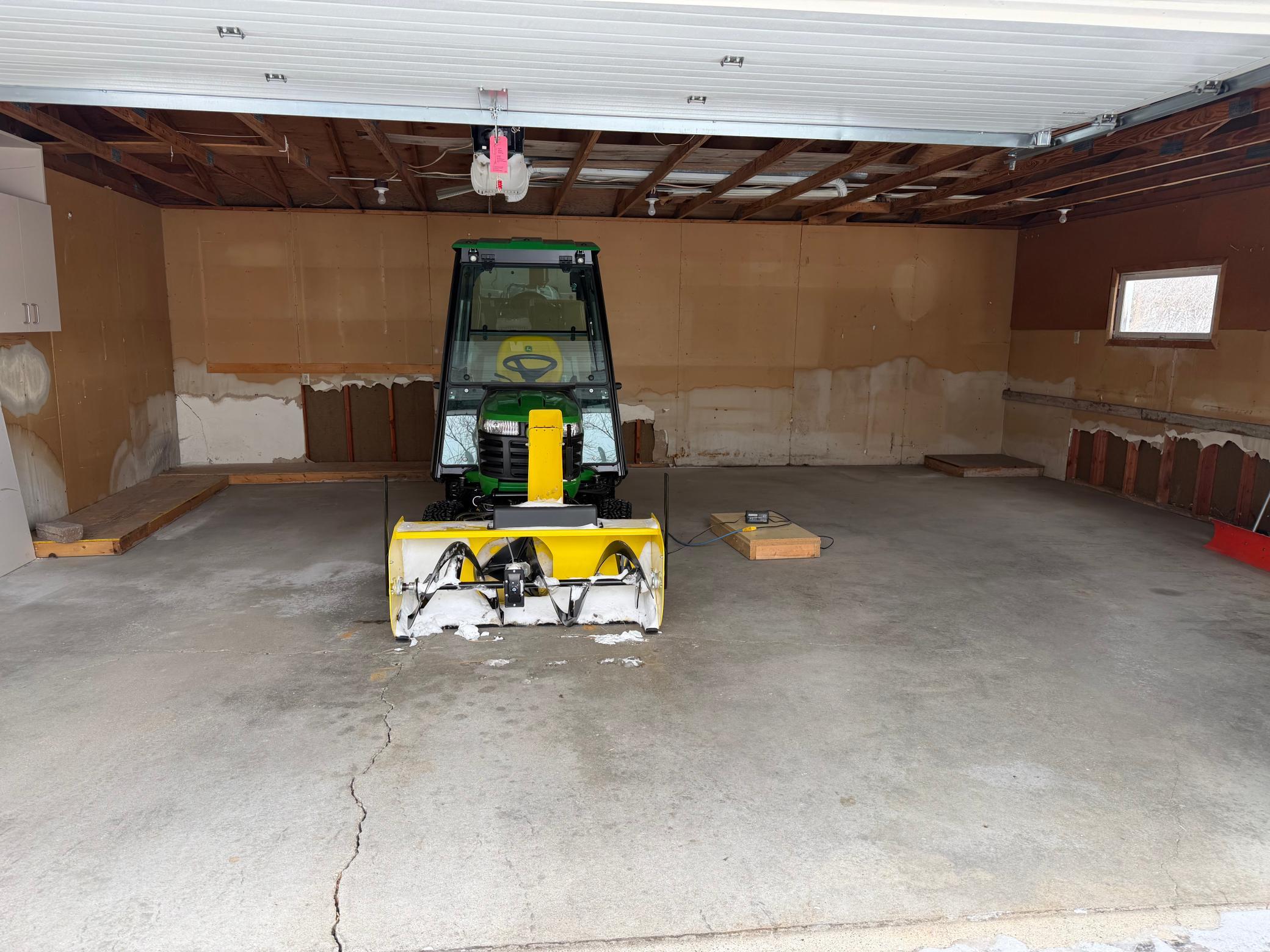 Inside double stall garage, snow blower not included