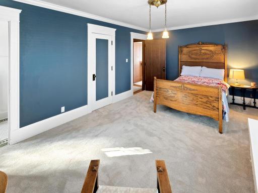 A generously sized bedroom with a comfortable layout and the added benefit of a private attached half bath.