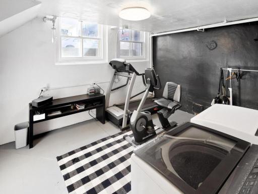Functional basement room providing laundry convenience and multi-purpose flexibility.
