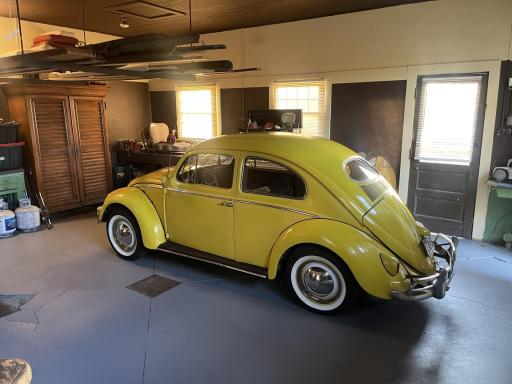 Impressive carriage house garage with professionally finished epoxy floors, offering both durability and a clean, showroom-style appearance. Also features a built-in mechanicâs service pitâperfect for car enthusiasts or hobbyists.