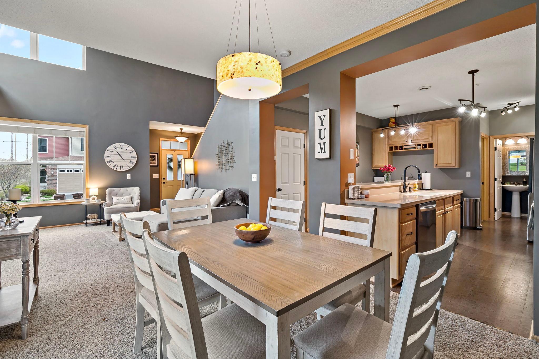 Open concept of living room, dining room and kitchen