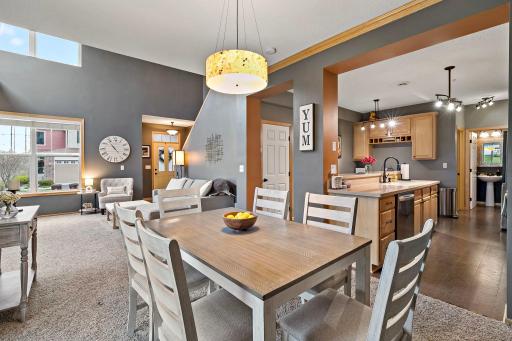 Open concept of living room, dining room and kitchen