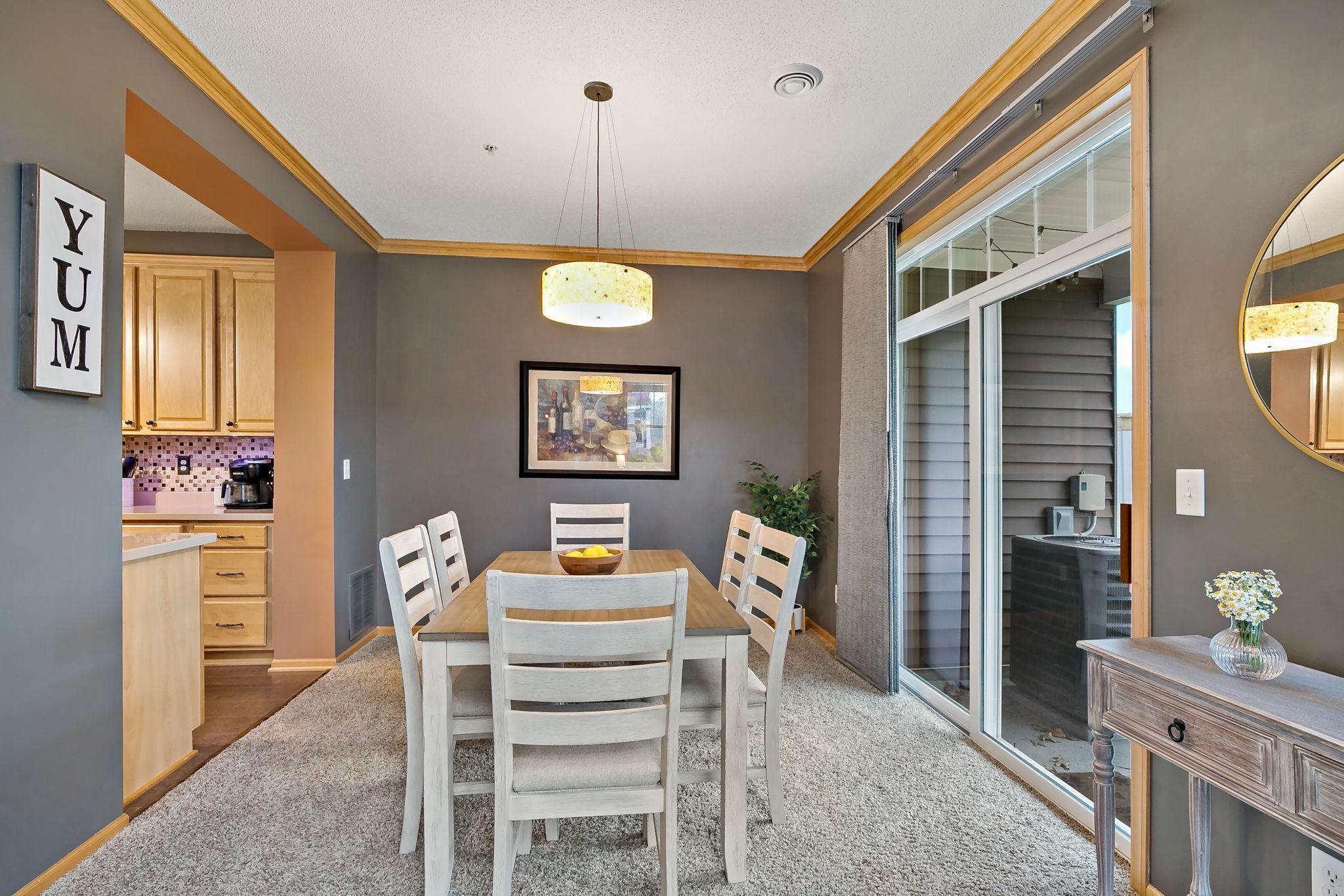 Lovely sliding glass door to side patio
