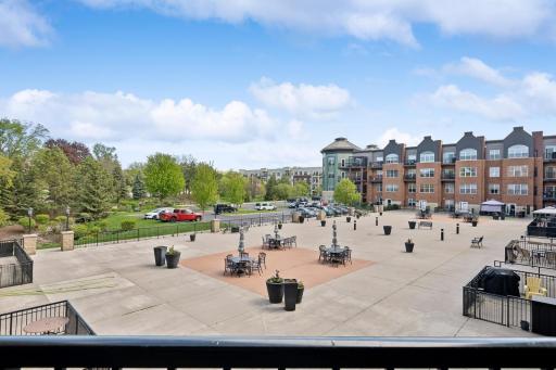 Summer view of front patio and parking lot for guests.