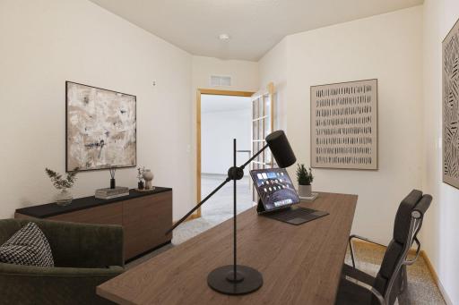 Second bedroom or den area. This room does not have a window but does have a good-sized closet. (digitally staged)