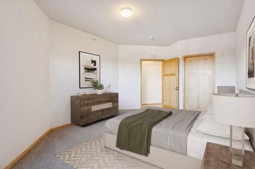 Additional view of primary bedroom. Maple panel doors.