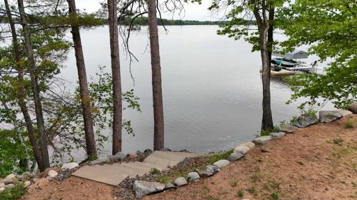 Lakeshore has been improved with gorgeous cement steps down to the water.