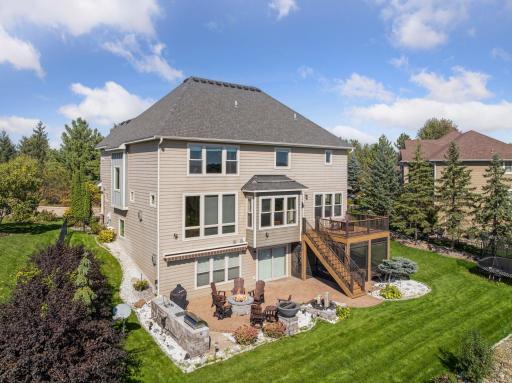 The backyard is where this property truly shines—over $100,000 was invested to create a premier entertaining space.