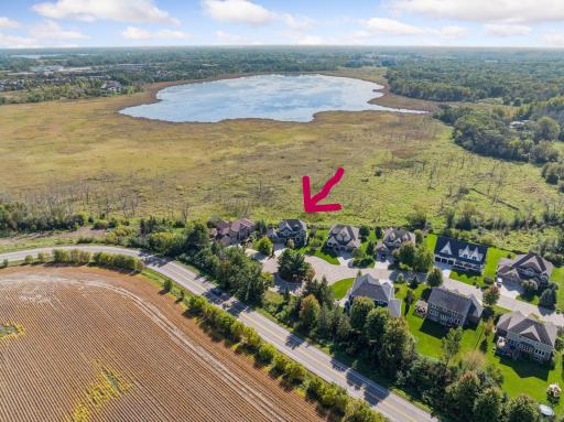 With direct access to over 600 acres of protected nature trails, rolling grasslands, and two serene lakes, the setting is unmatched.
