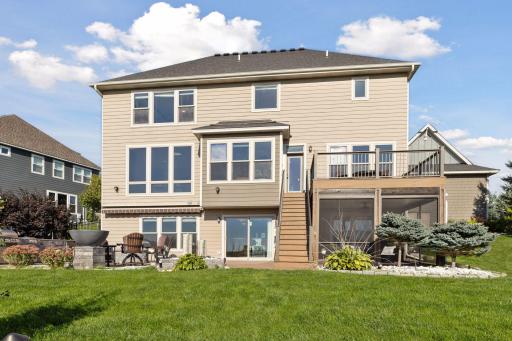 For quieter evenings, enjoy the elevated composite deck or the screened-in porch—perfect for relaxing bug-free while overlooking the preserve.