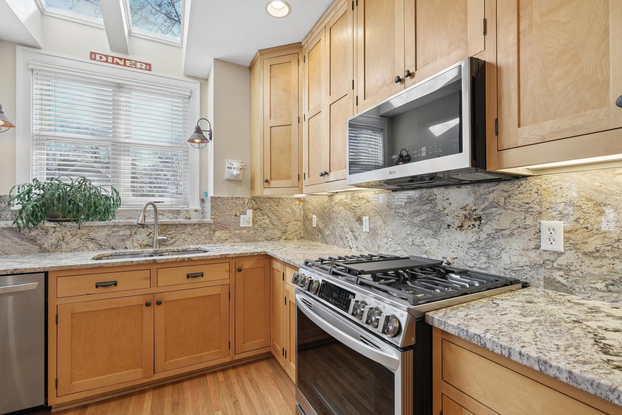 Custom cabinetry. Gas stove and built-in microwave