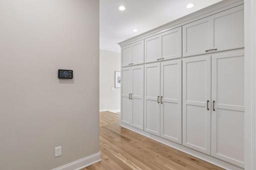 Ultra-convenient mudroom area added in 2024, with custom built cabinets for keeping the household organized.
